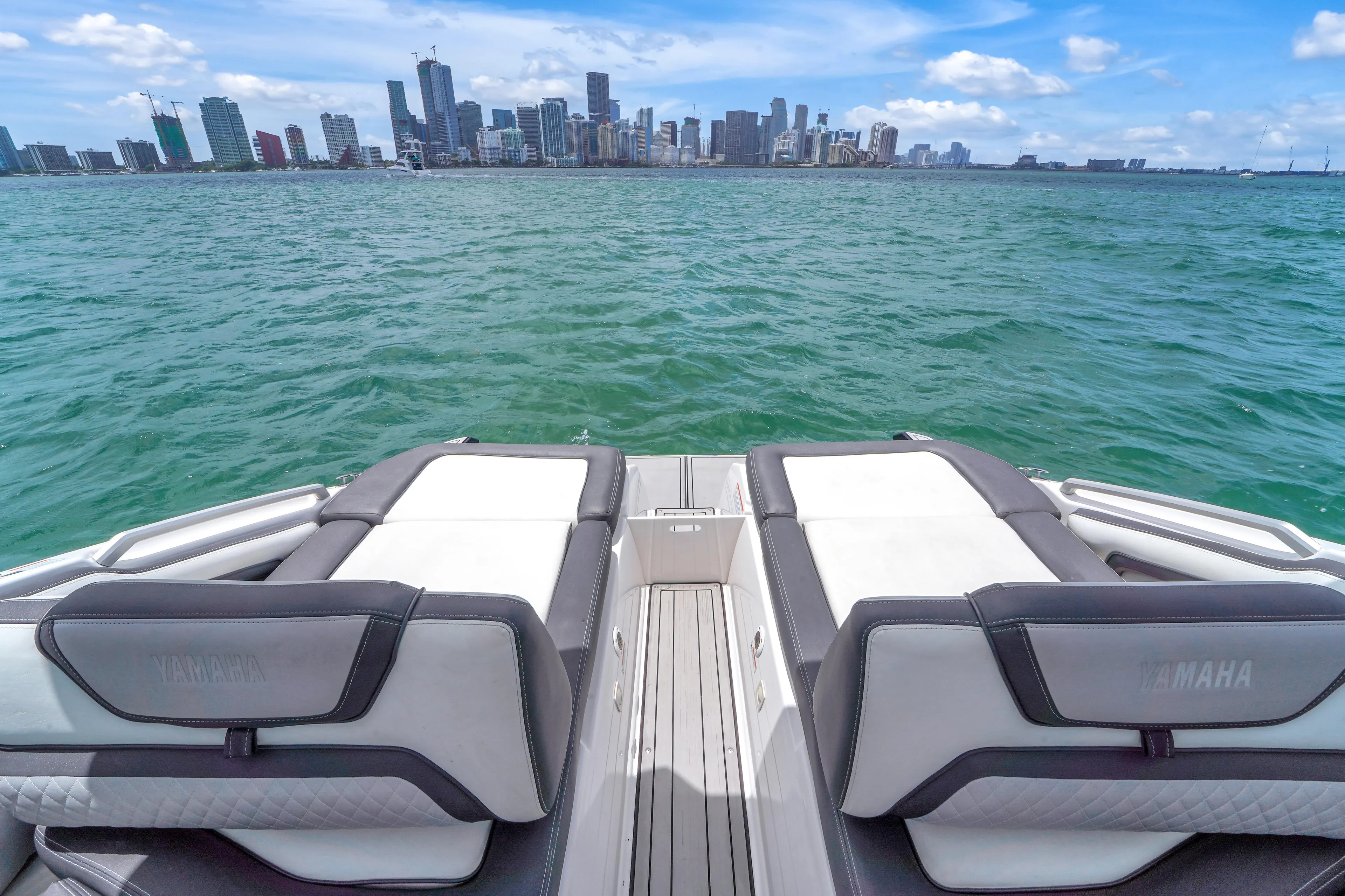 Aft seating view toward open water and skyline